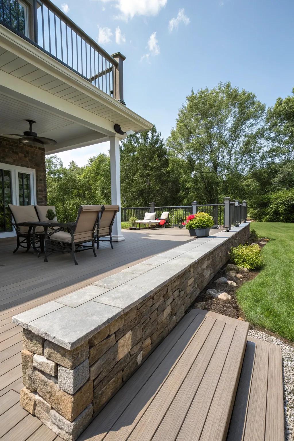 A deck that stays pristine with durable, low-maintenance stone skirting.